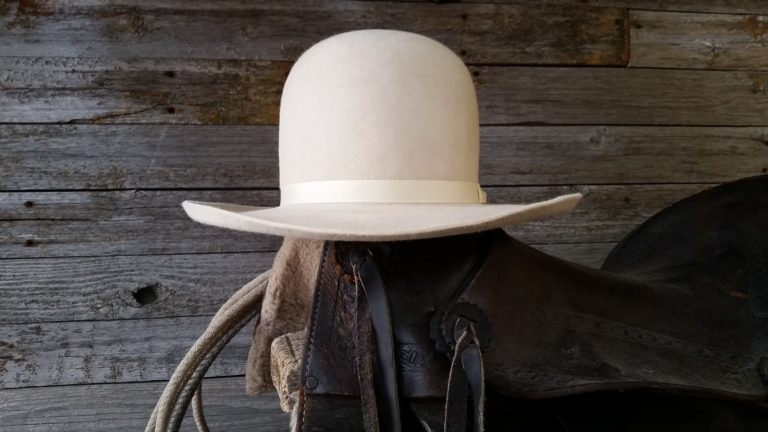 cowboy hat flick meaning